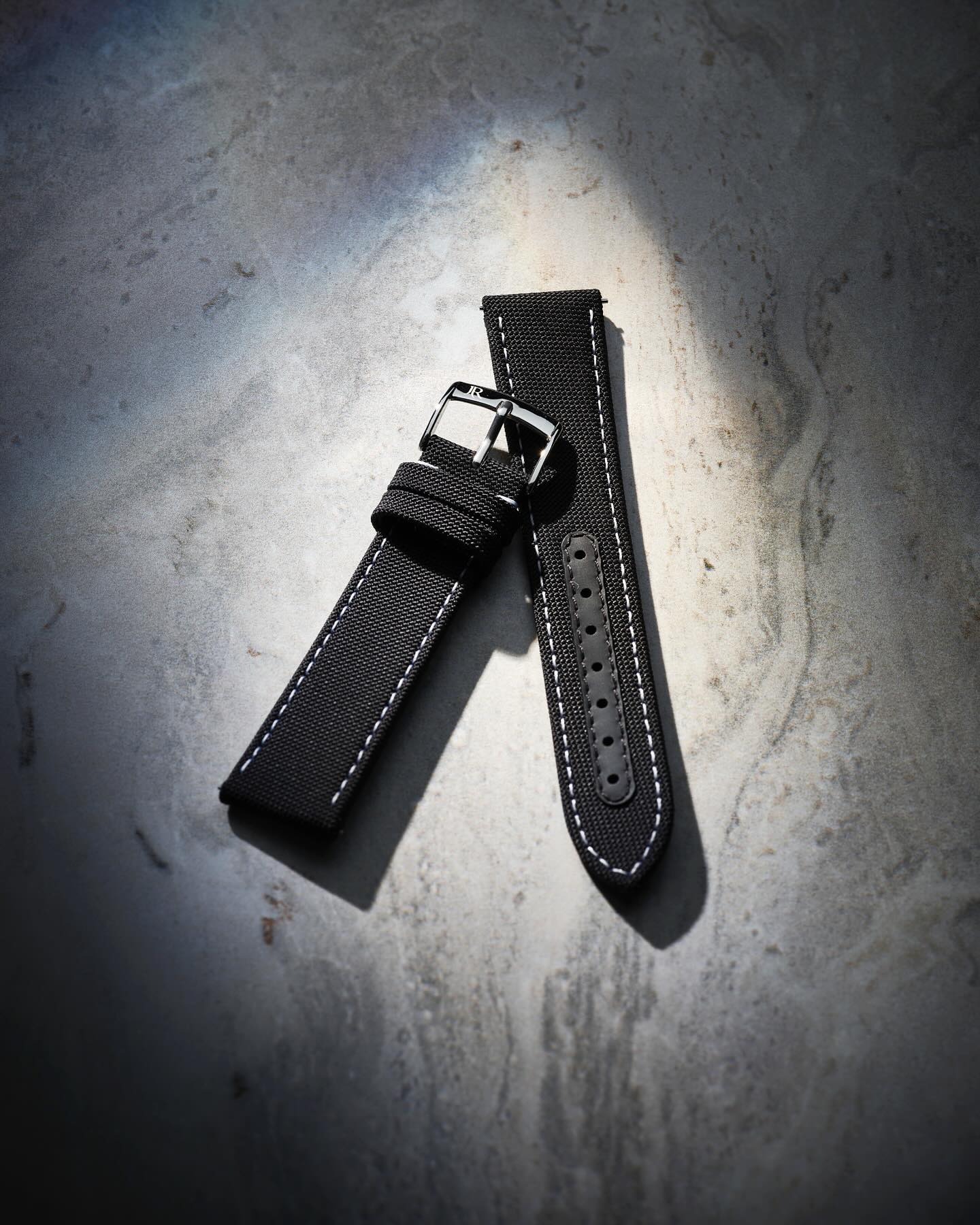 Made to echo the spirit of Eska.This technical fabric strap, with white stitching, was designed ....